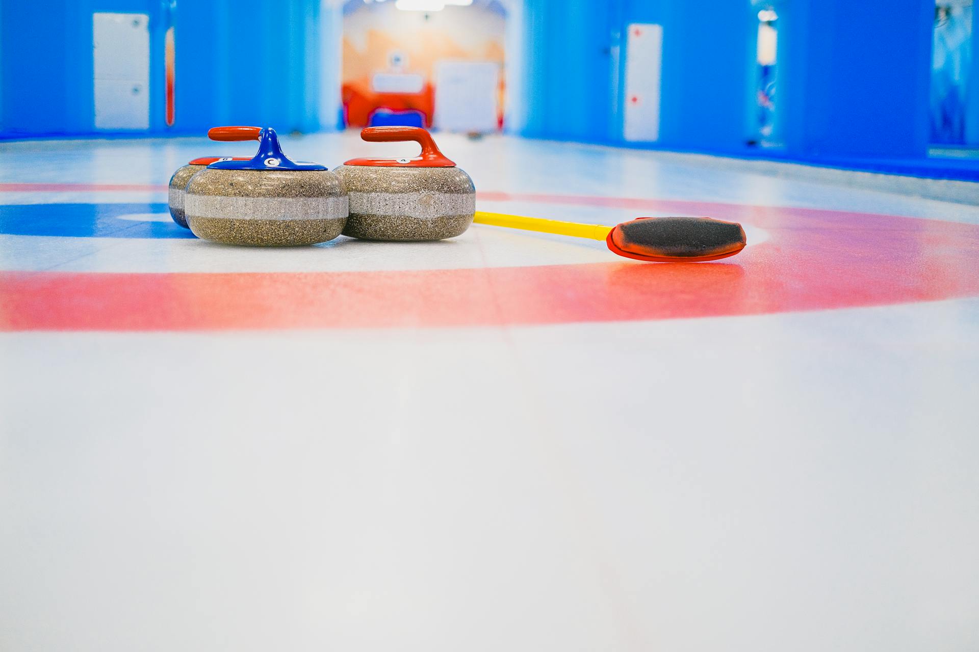 Curling stones in target area