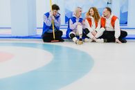 Talking curler players chilling on floor