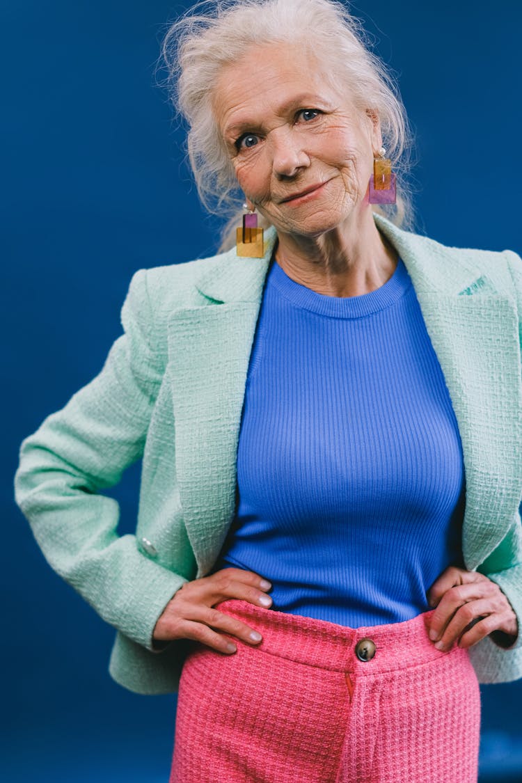 Elegant Aged Woman In Colorful Clothes