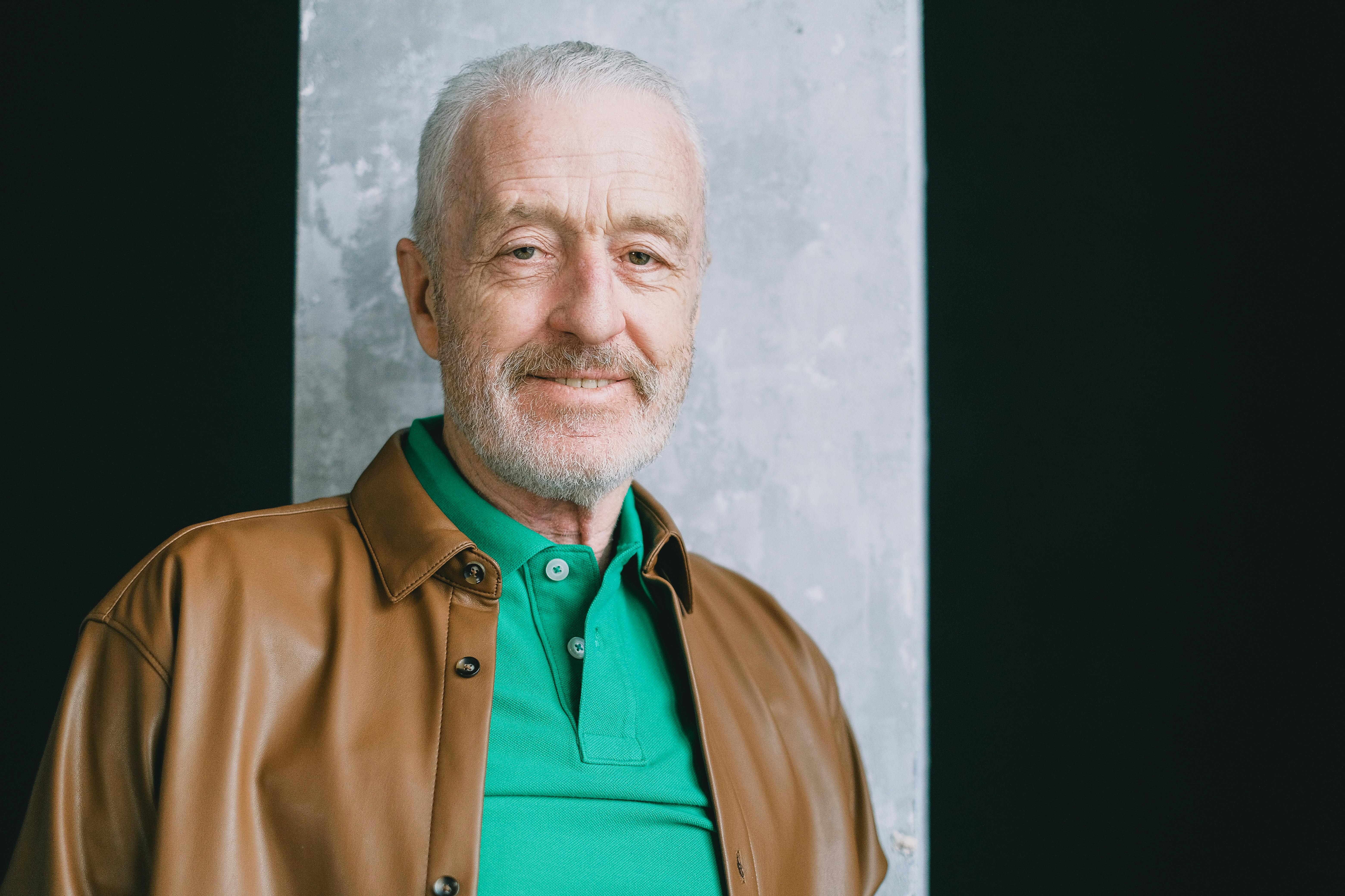 portrait of old man posing outdoors