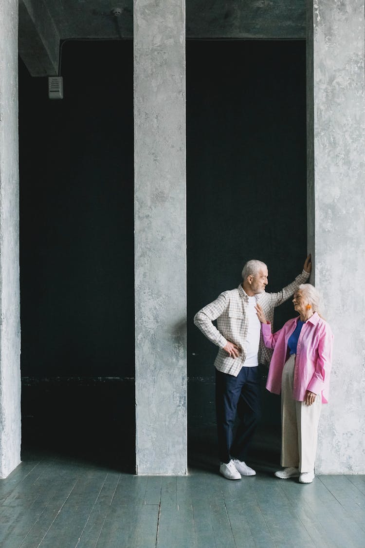 Senior Couple Talking Outdoors At Night