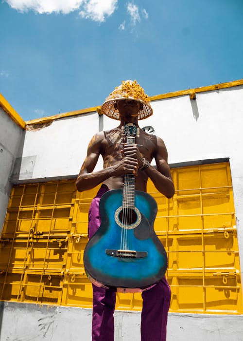 Free Kostnadsfri bild av akustisk gitarr, allt gult, arkitektur Stock Photo