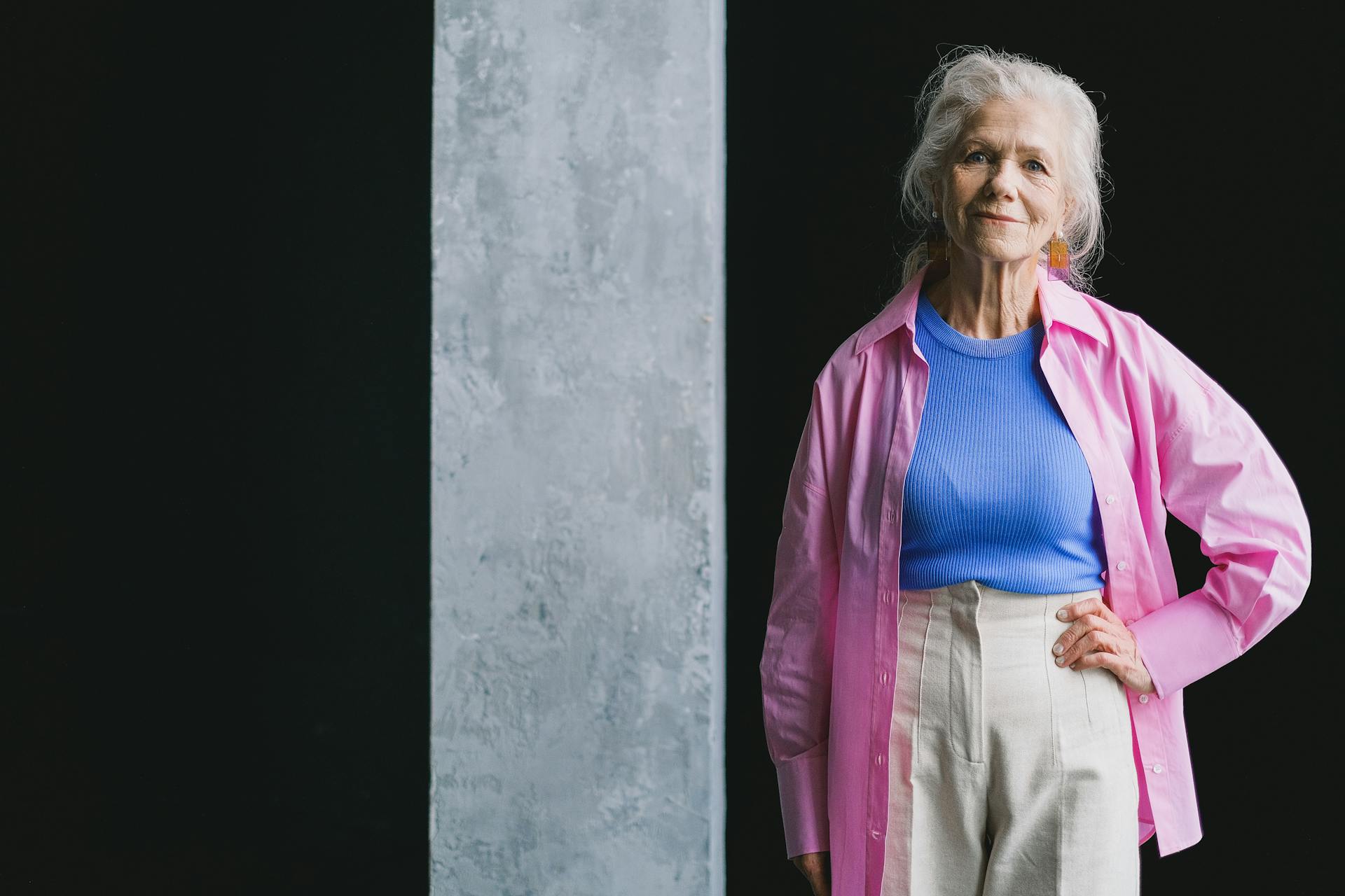 A Woman with Gray Hair with Her Hand on Her Waist