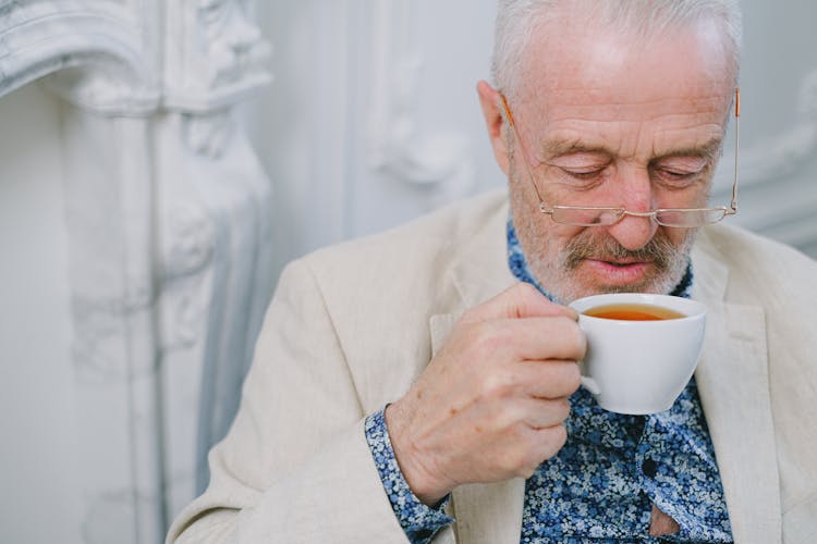 Elderly Man Drinking Tea