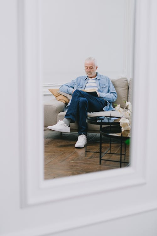 Elderly Man Reading a Book