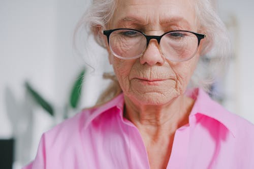 Free A Close-up Shot of an Elderly Woman Wearing Eyeglasses Stock Photo