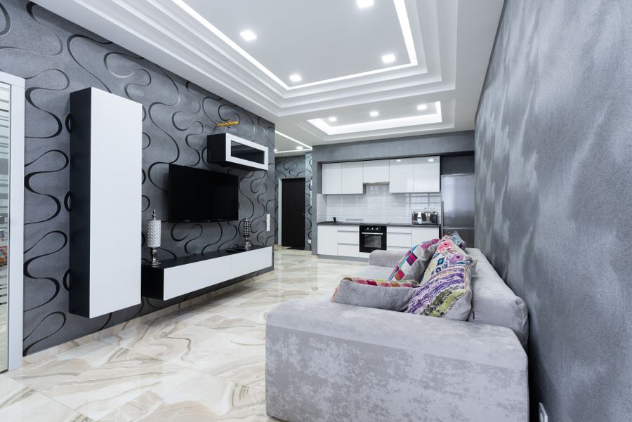 Living room with grey sofa on Tidewater Floors large-format tiles