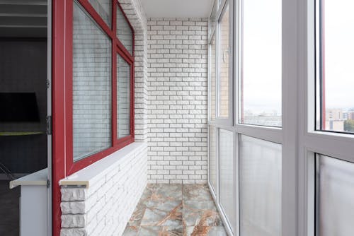 Free Empty balcony with light brick walls Stock Photo