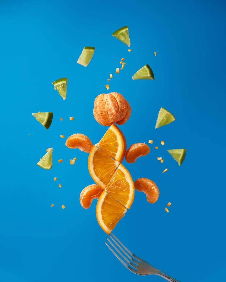 Pieces Of Orange And Lime Up In The Air