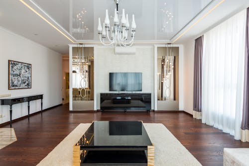 Room with TV and Chandelier
