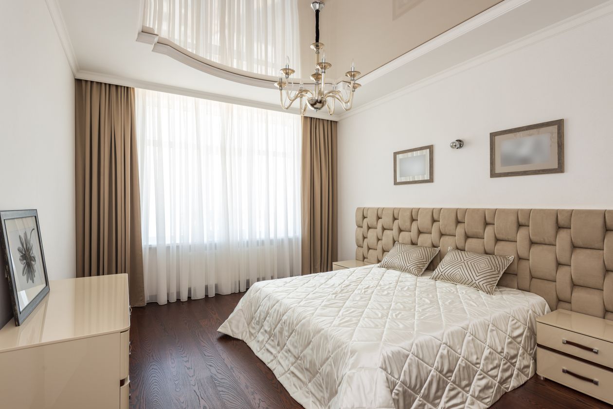 Cozy bedroom with textured rug and warm tones