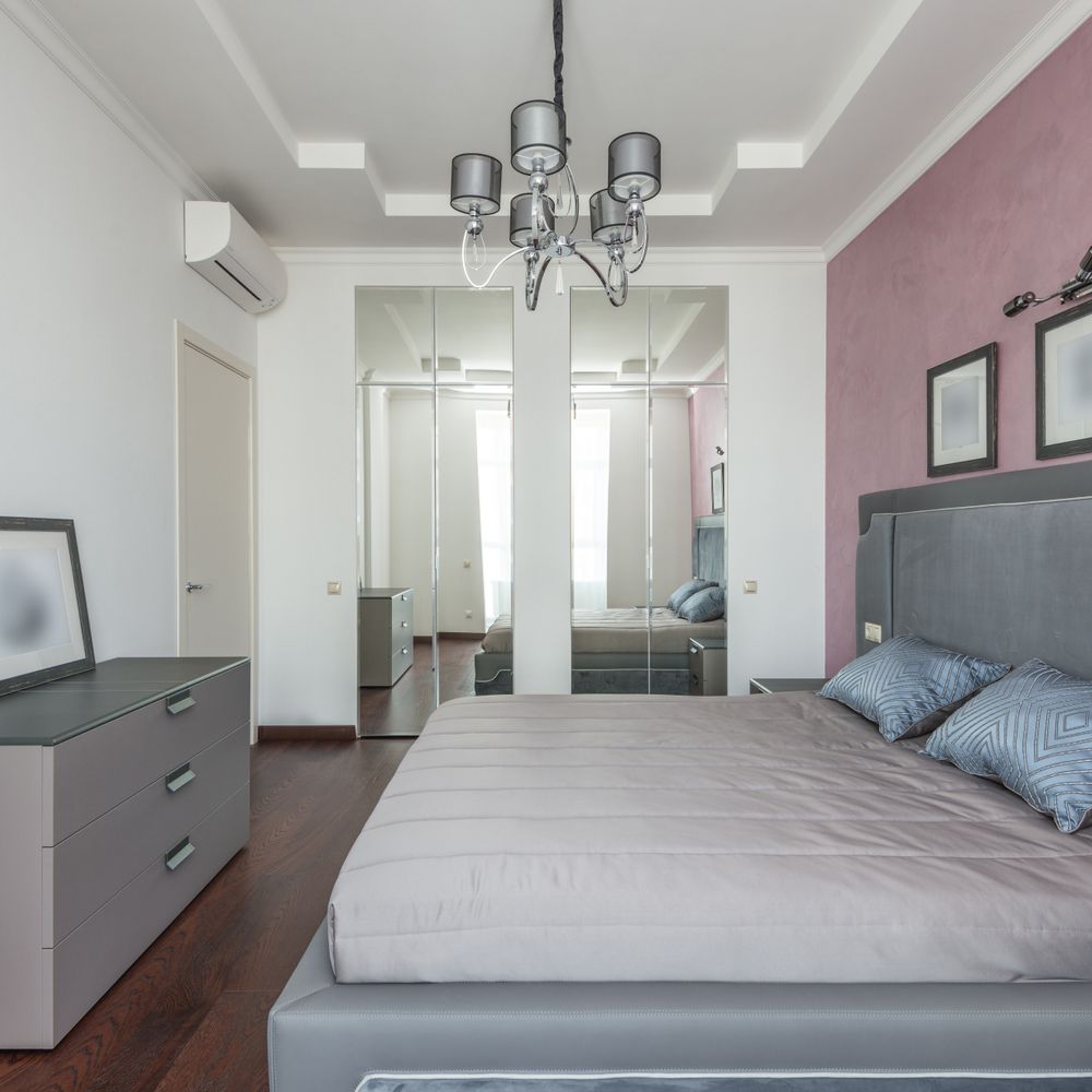 Rock — professional movers carrying furniture on a house move