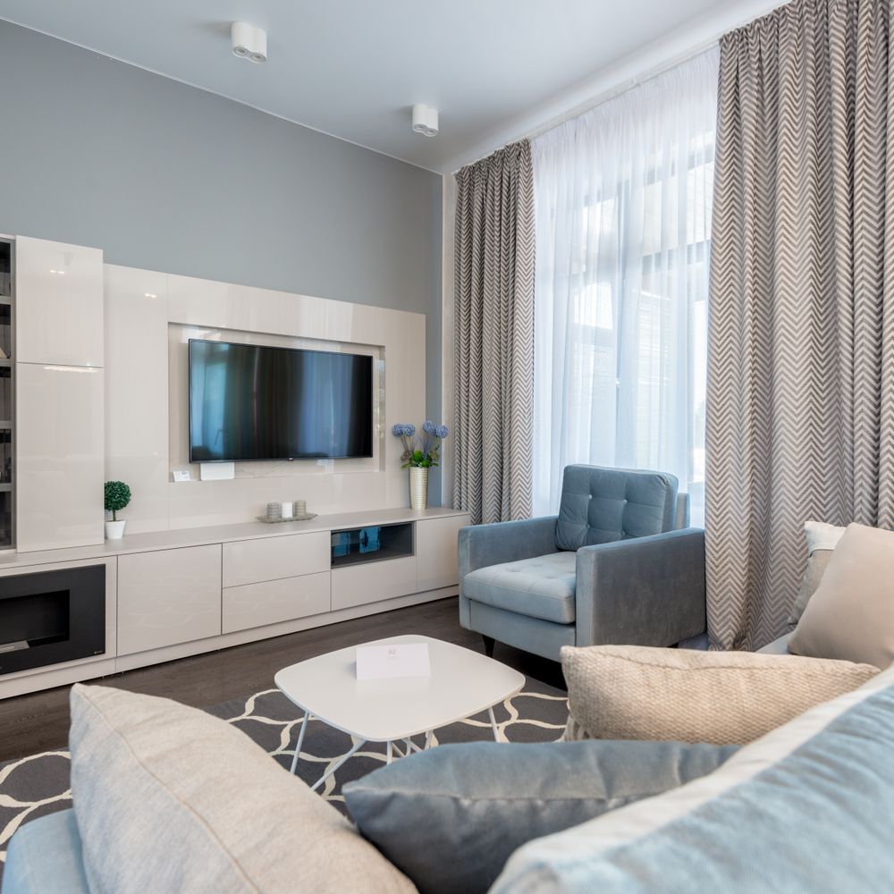 Stapleford Tawney — professional movers carrying furniture on a house move