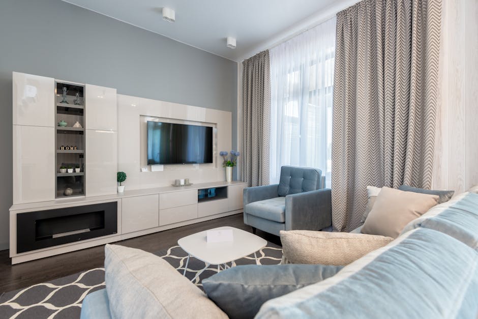 Modern medium sized living room with a 1 ton mini split installed on the wall Modern medium sized living room with a 1 ton mini split installed on the wall