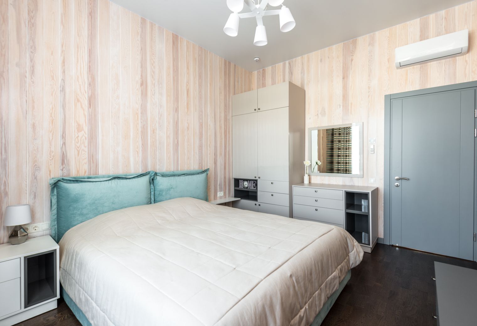 Wallpapering in West Kensington — a decorator at work mid-project