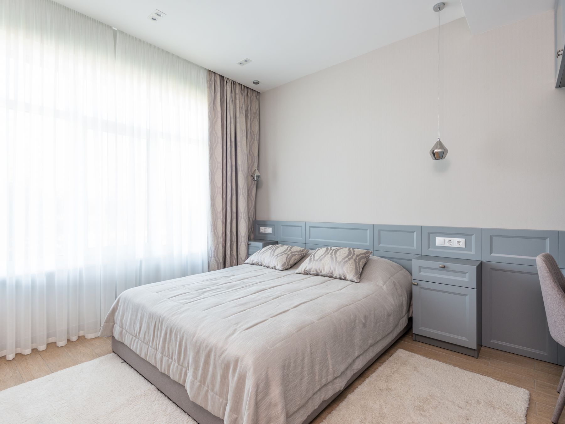 Dunston — professional movers carrying furniture on a house move