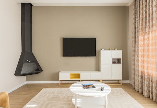Free Modern Living Room with a Fireplace Stock Photo