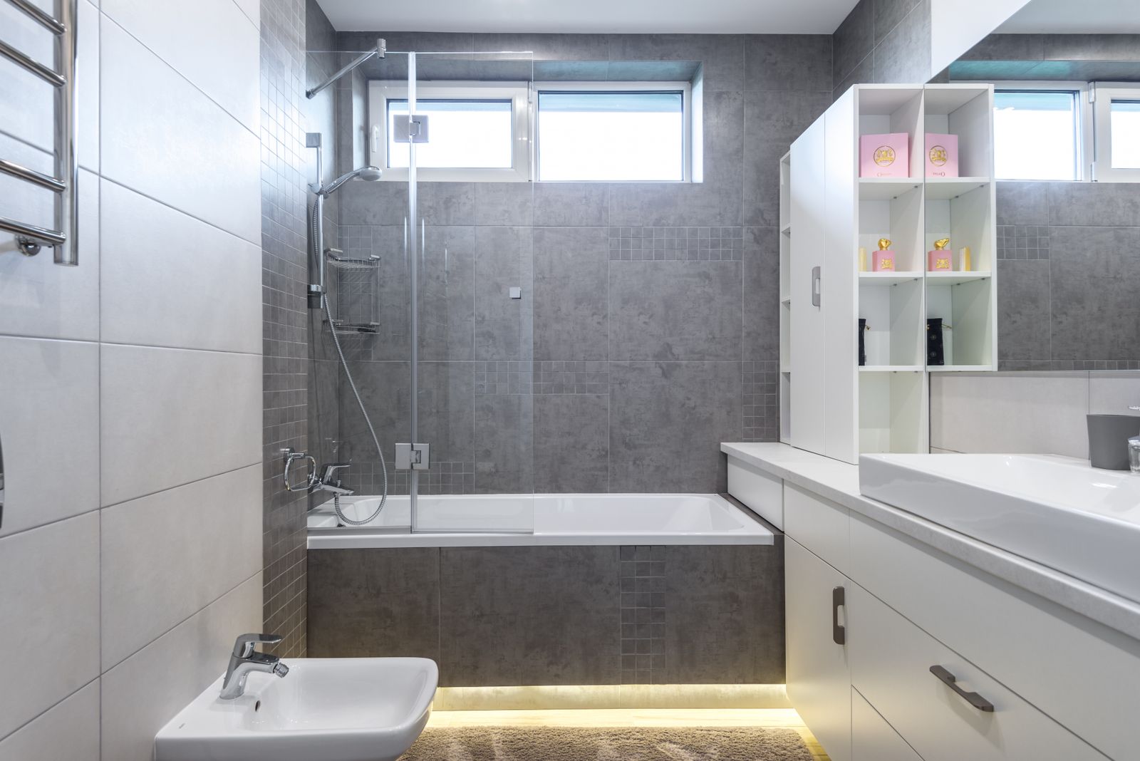 Modern bathroom with a vanity, shower and bathtub