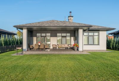 Backyard with manicured lawn