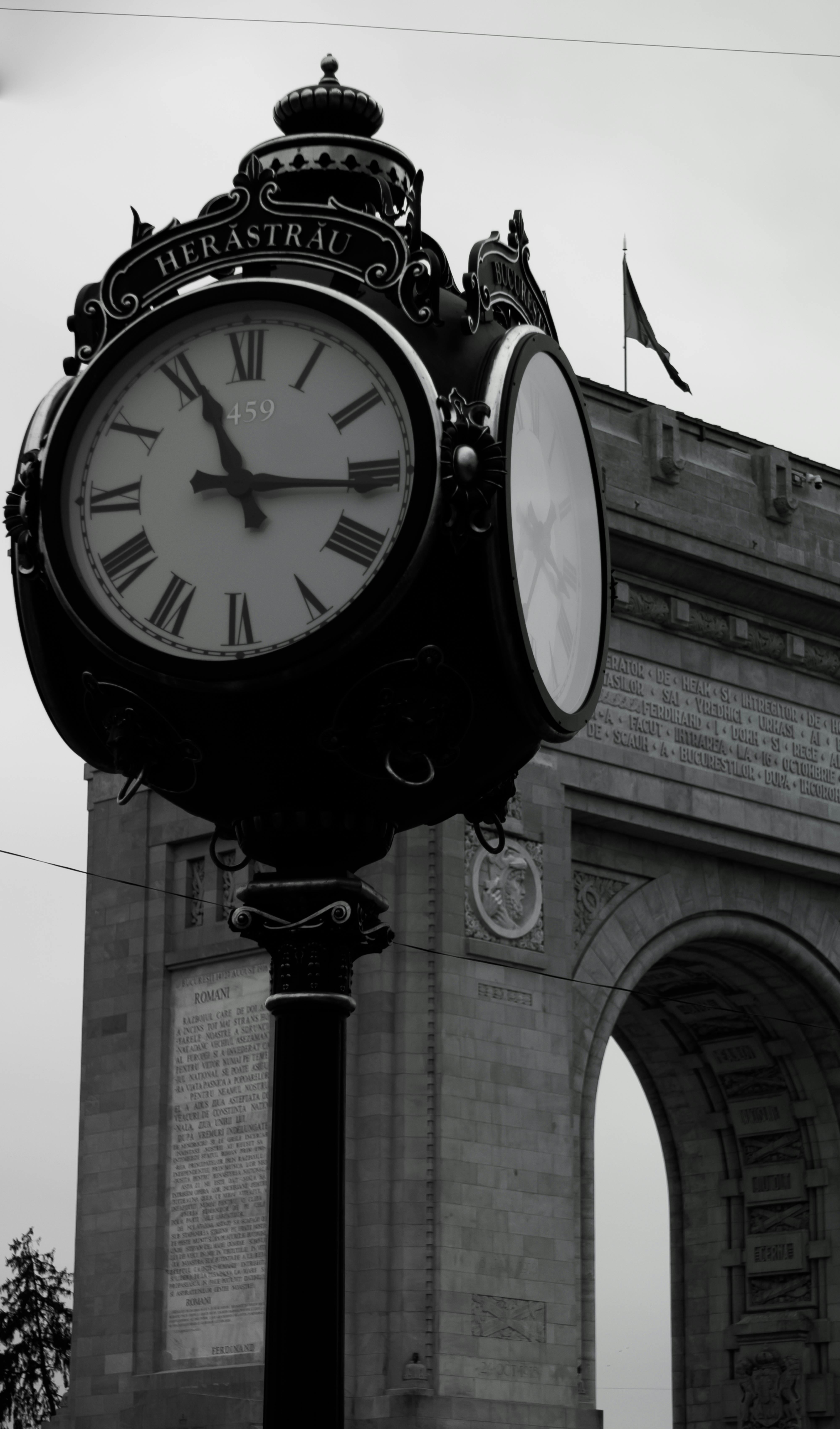 black and white analog clock at