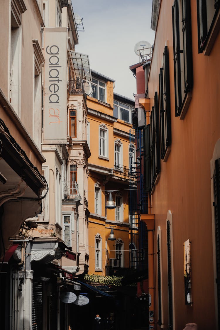 A Narrow Alley Between Old Apartment Buildings