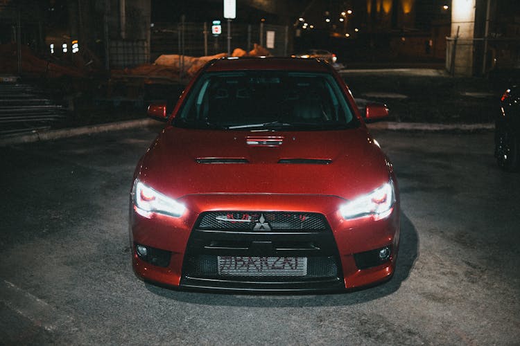 Red Car On Dark Street