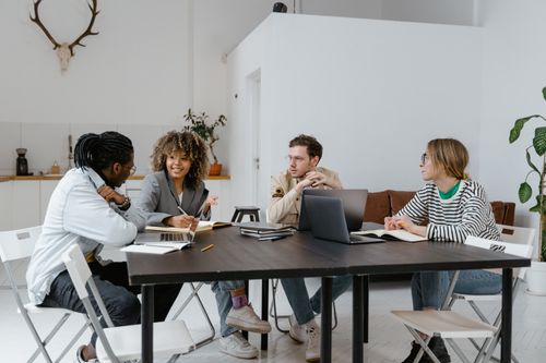 Coworkers collaborating in a modern office setting