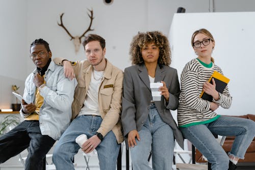 People Sitting on the Office Desk