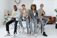 3 Women and 2 Men Sitting on Chair