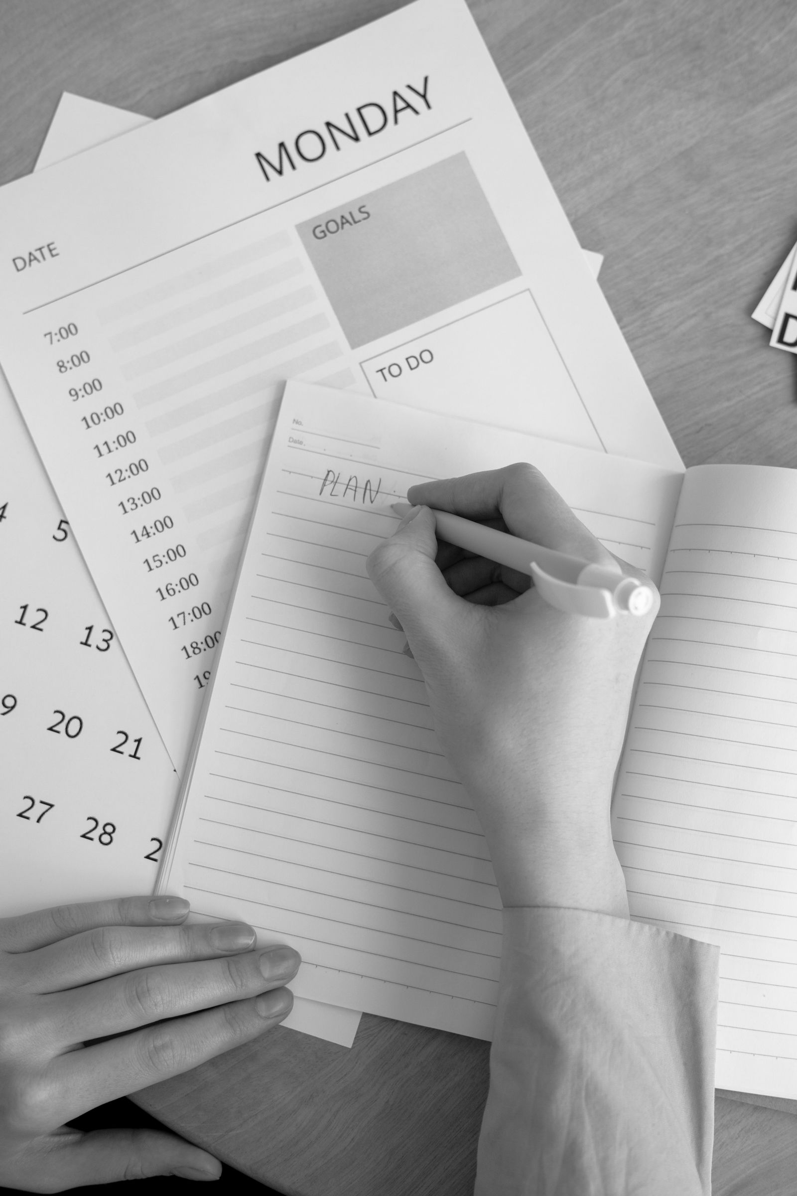 Weekly planning notebook with calendar and goals