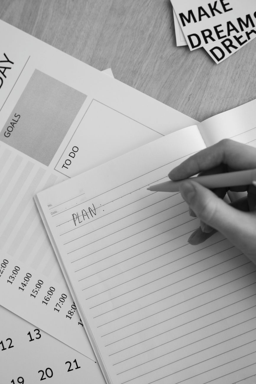 Simple to-do list written in a planning notebook