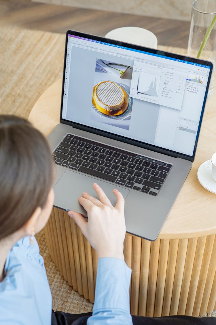 Close-Up Shot Of A Person Using A Laptop