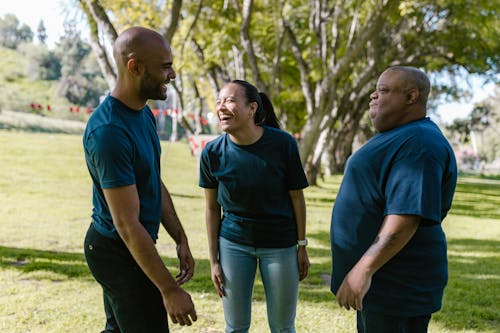 People in Blue Crew Neck T-shirt With Happy Faces