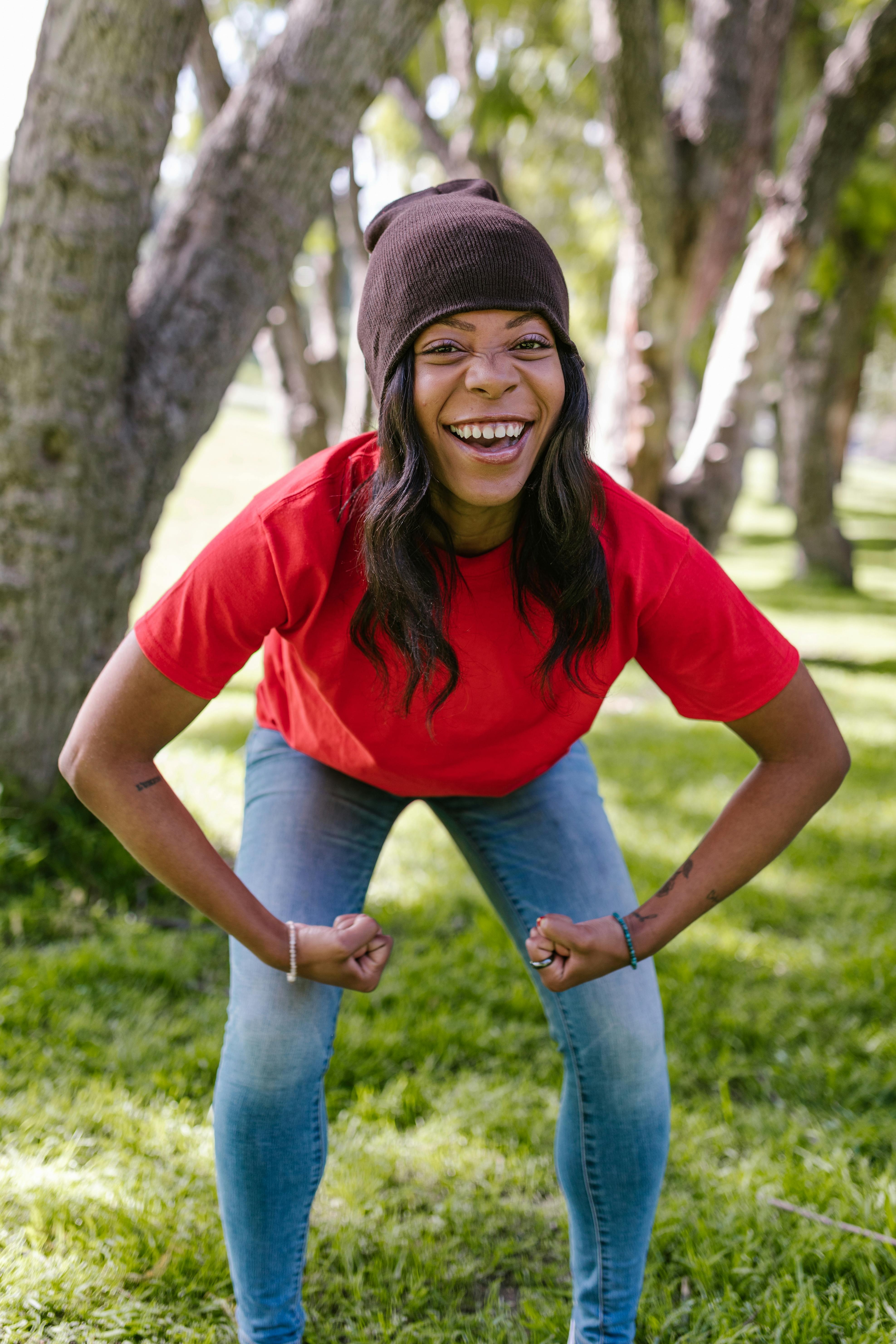 Man wearing a stylish flex fit flat brim hat in urban setting