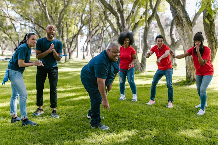 Group Of People Playing Outdoors