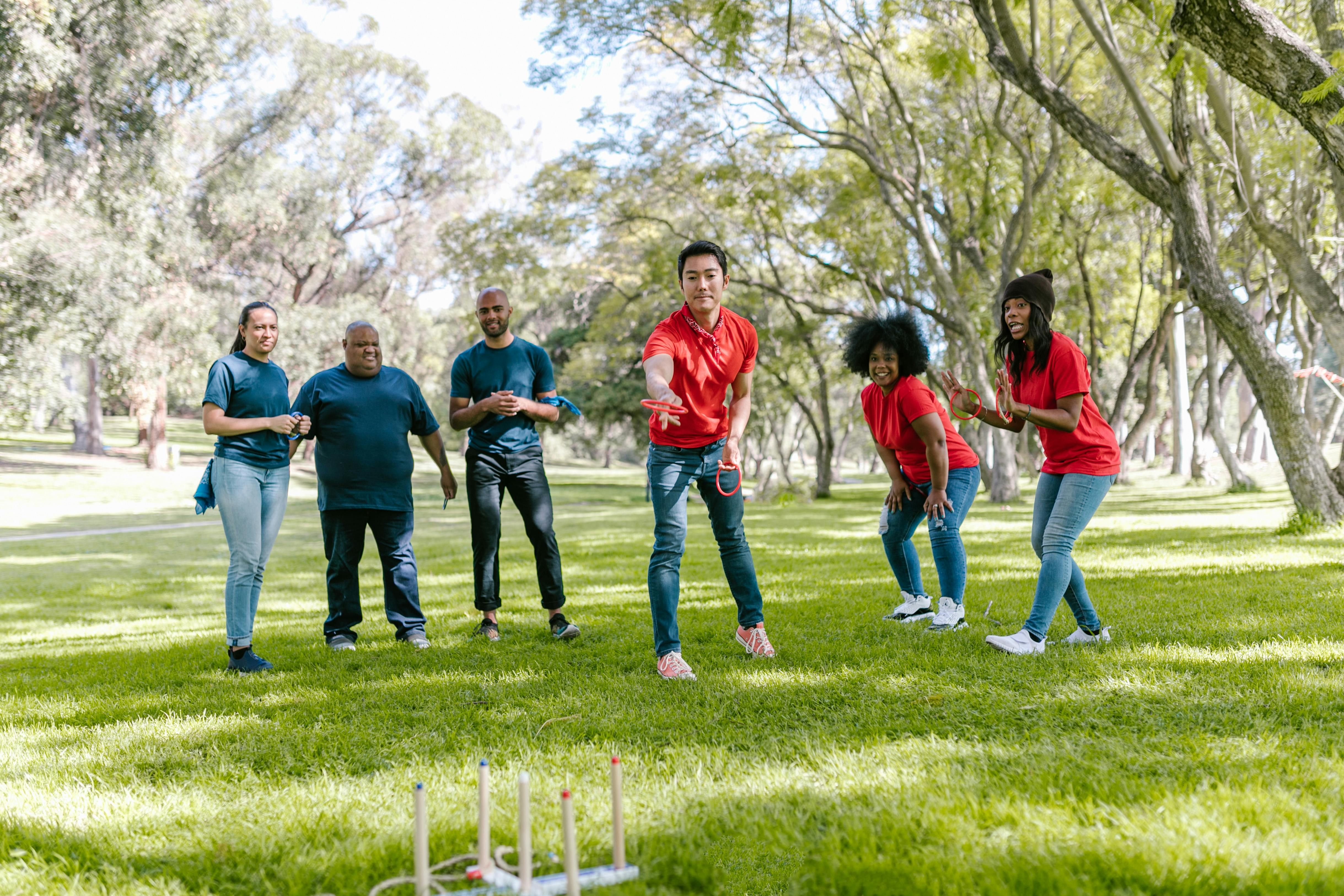 Group Of People Playing Ring Toss · Free Stock Photo