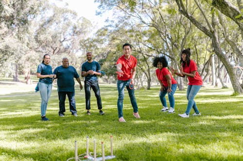 Group of People Playing Ring Toss