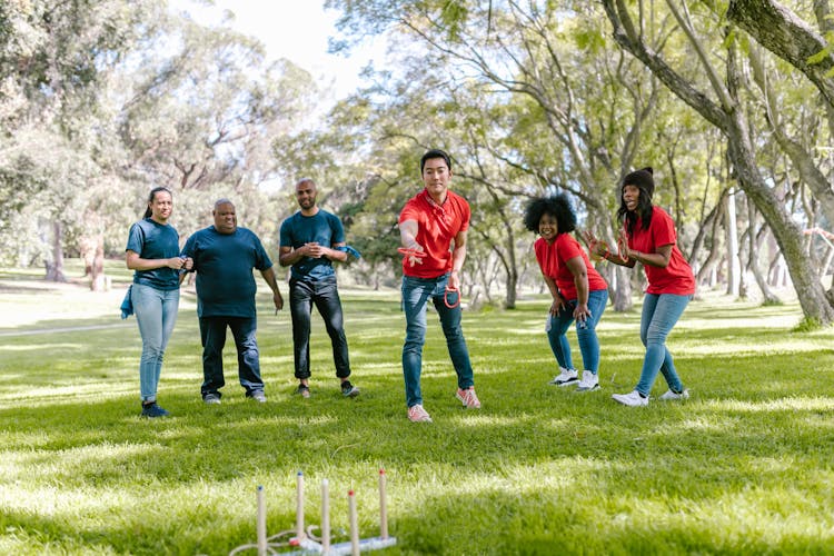 Group Of People Playing Ring Toss