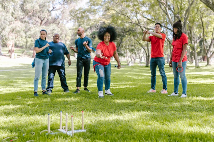 Group Of People Playing Ring Toss