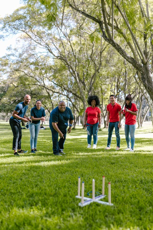 Group of People Playing Ring Toss