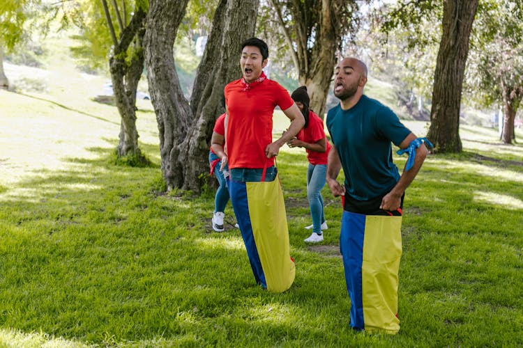 Men Playing Sack Race