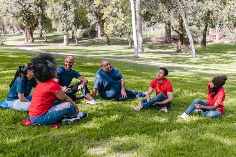 Diverse group of adults enjoying an outdoor group activity