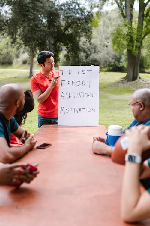 Free Man Speaking To A Group On Team Building Stock Photo
