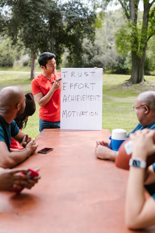 Free Man Speaking To A Group On Team Building Stock Photo