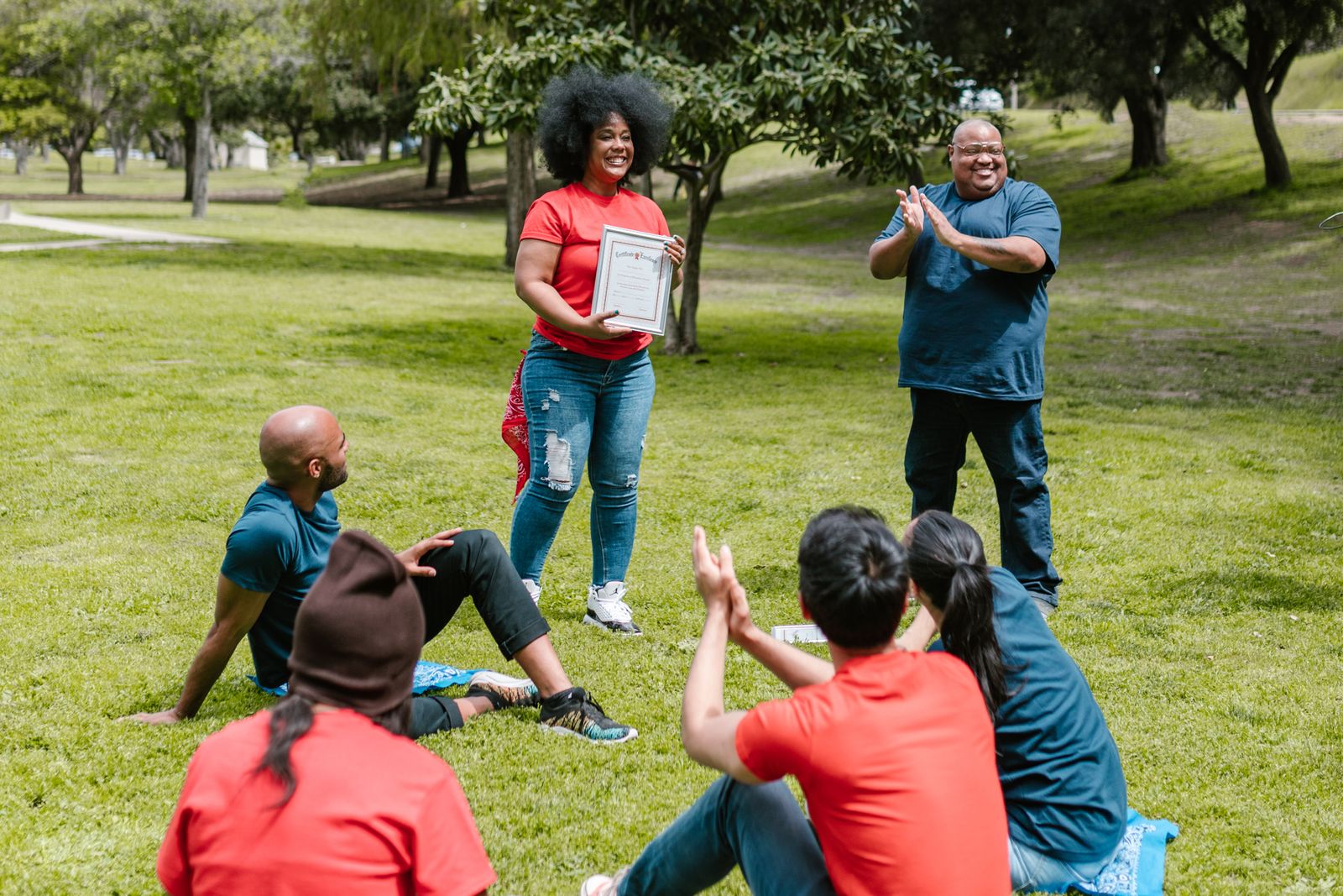 A group celebrating together at an award ceremony. Photo by RDNE Stock project on Pexels