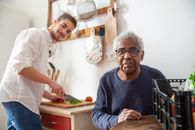 An Elderly Man Sitting while Wearing Eyeglasses