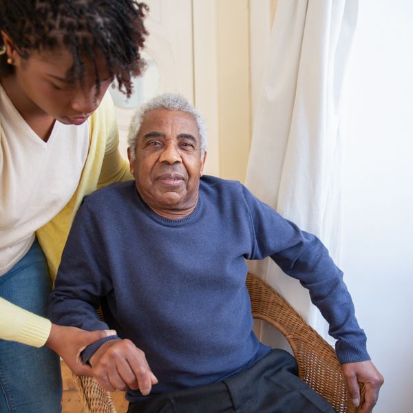 Volunteer with elder