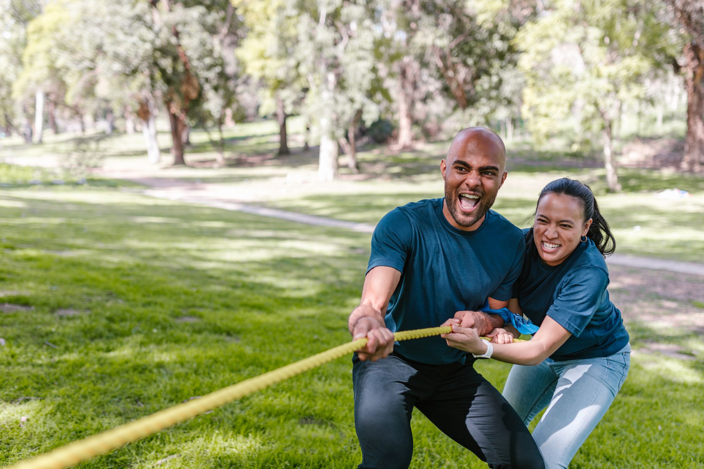 Person Pulling At Ropes Man And Woman Pulling A Rope · Free Stock Photo