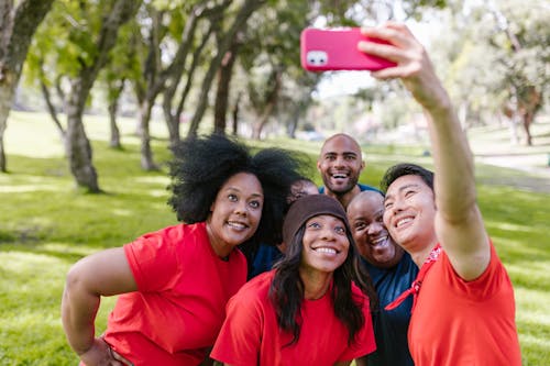 Group of People Taking Photo