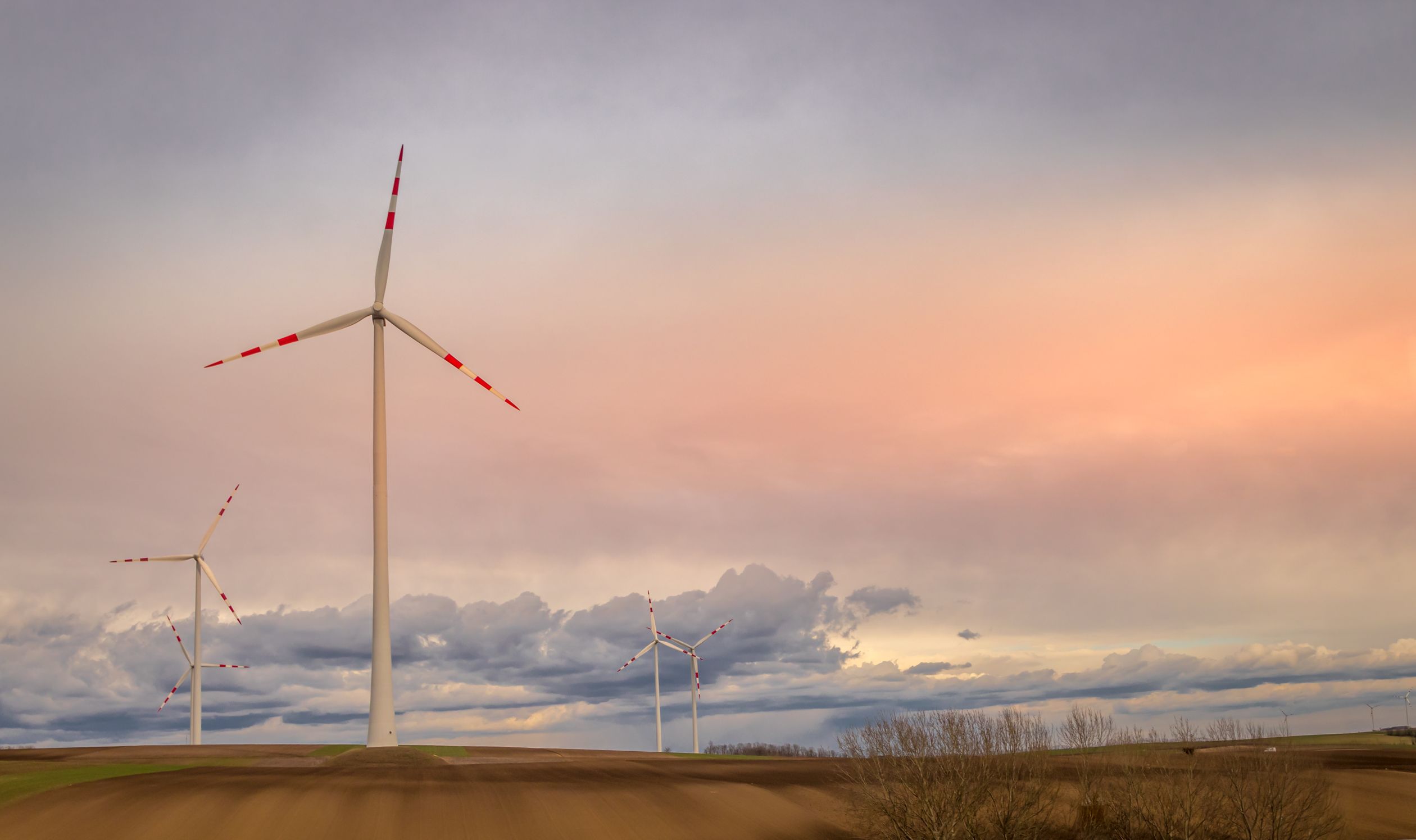 White Wind Turbines on Brown Field · Free Stock Photo